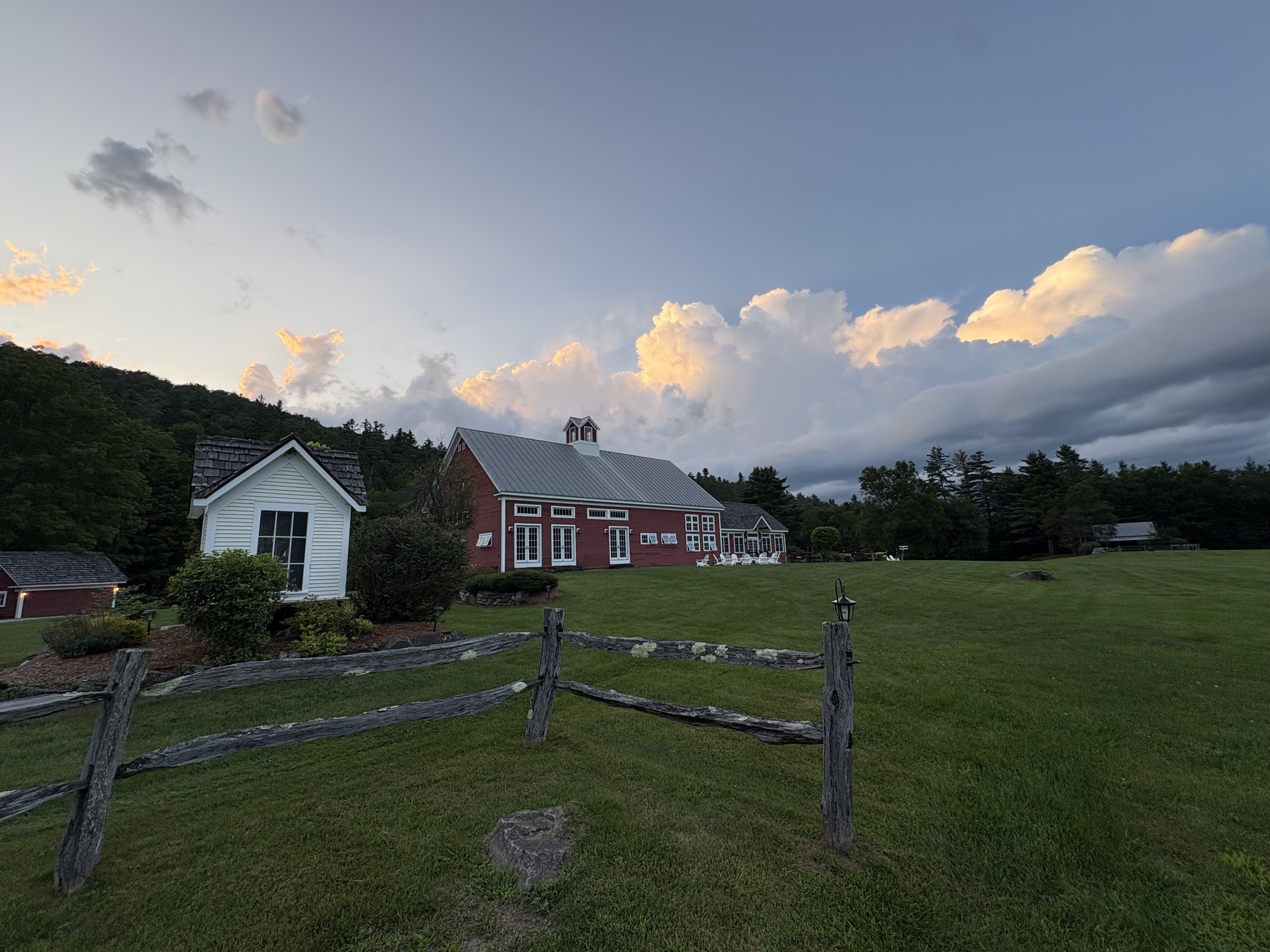Riverside Farm barn and cottage at dusk