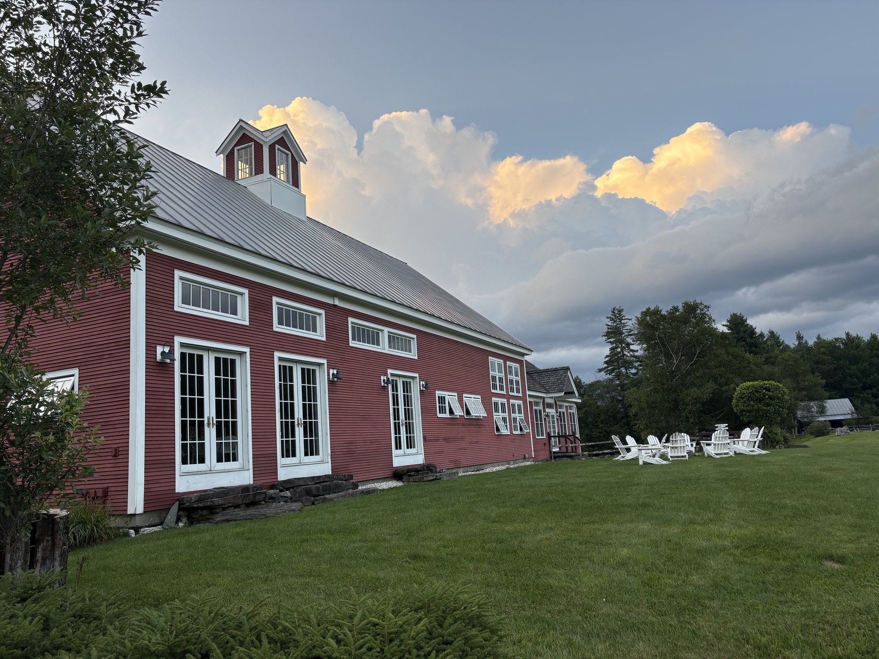 Riverside Farm barn, side view at dusk